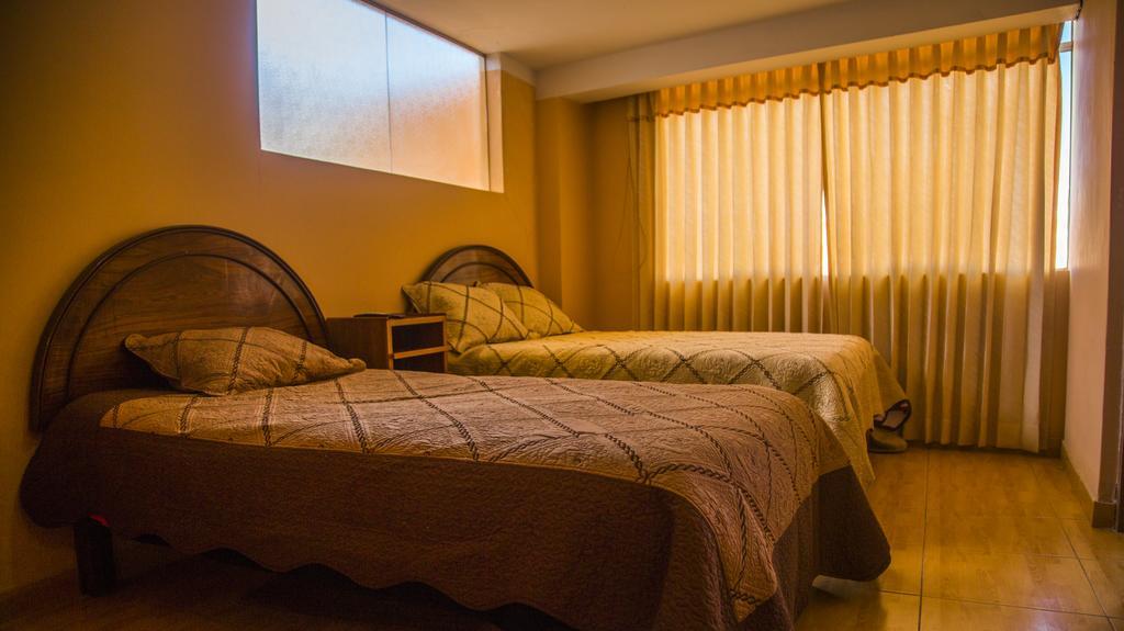 Wisny Inn Puno Quarto foto